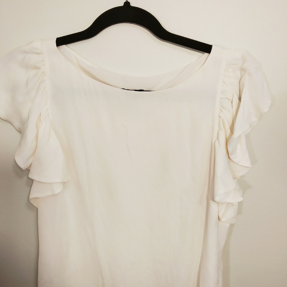 White ruffle top